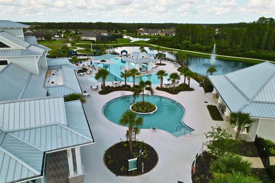 Resort-style pool with lap lanes, resistance pool and plenty of seating.
