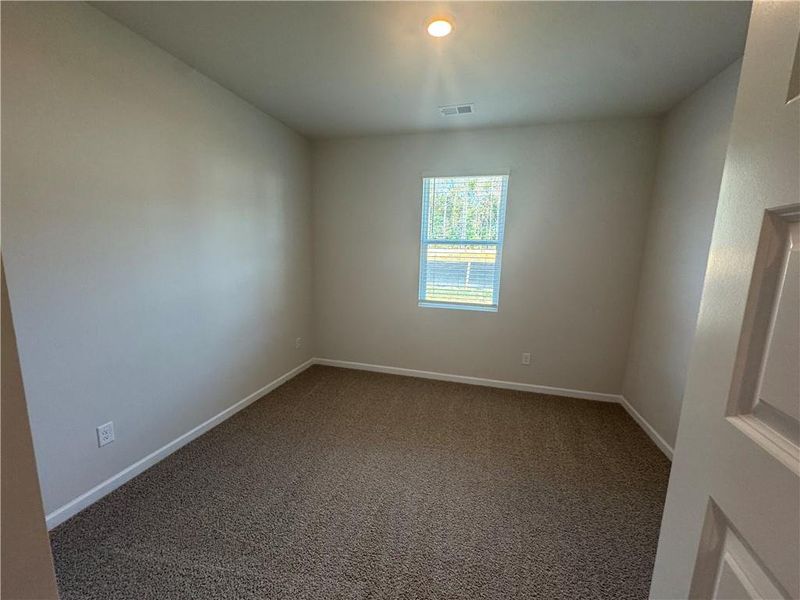 Spacious, unfurnished interior of a new home in Oakchase at Hampton, Hampton (Image 21).