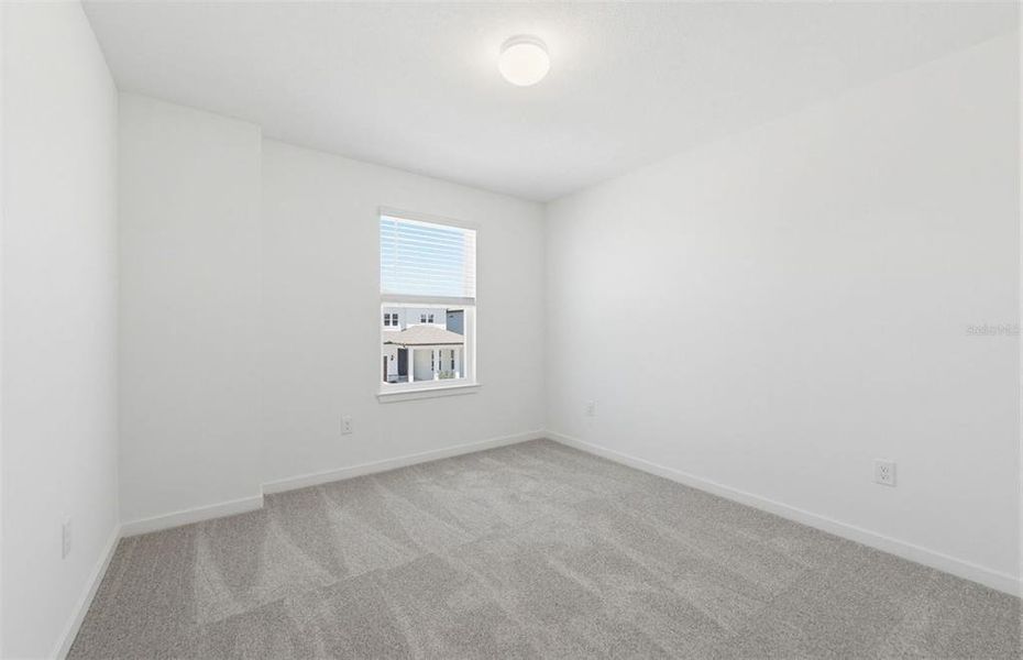 Spacious, unfurnished interior of a new home in Vida's Way, Wesley Chapel (Image 13).