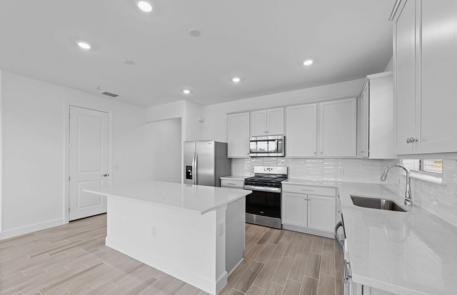 Furnished interior view inside a new home in Reagan Landing, Bradenton (Image 7).