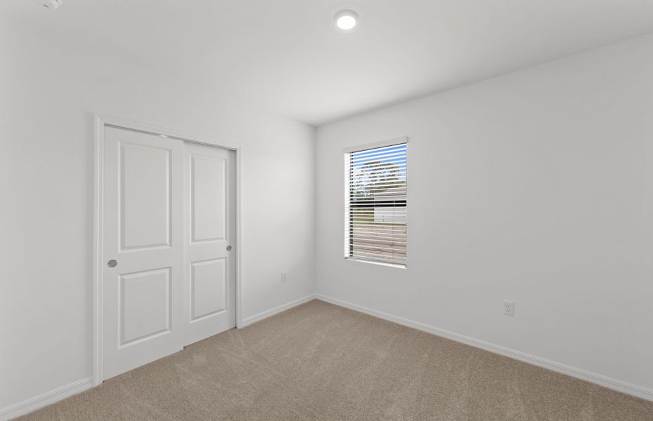 Spacious, unfurnished interior of a new home in Whispering Lakes, Lehigh Acres (Image 21).