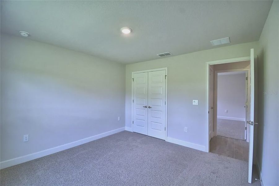 Spacious, unfurnished interior of a new home in Lake Juliana Estates, Auburndale (Image 30).