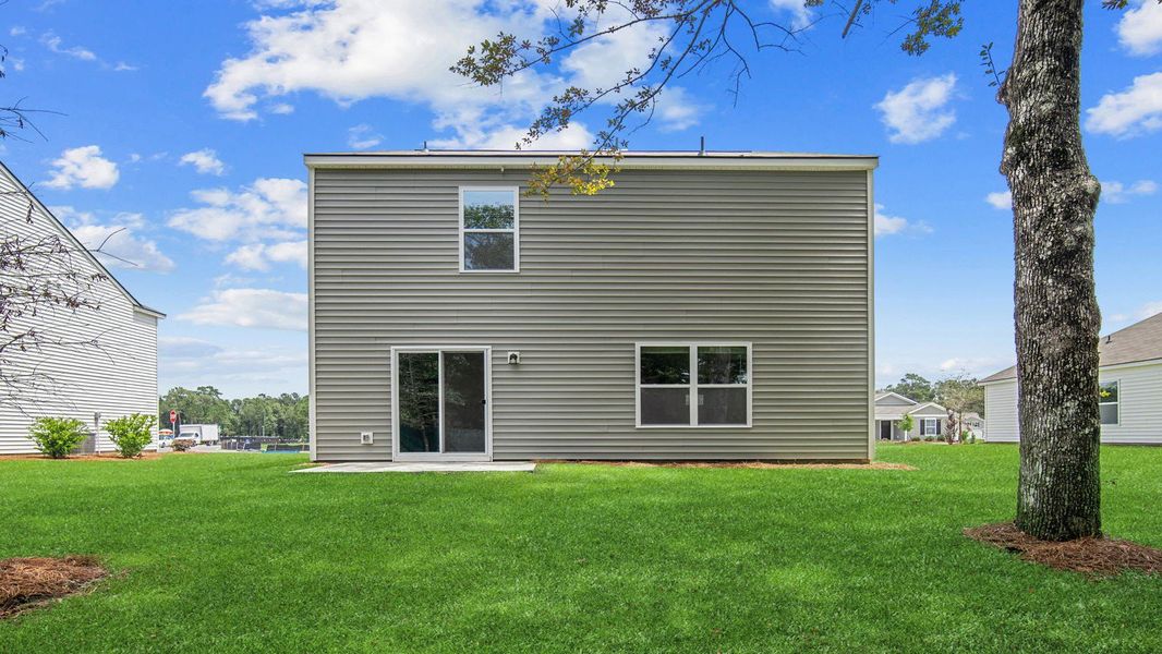 Exterior details and patio area of a home in Longleaf Village, Rincon (Image 3).