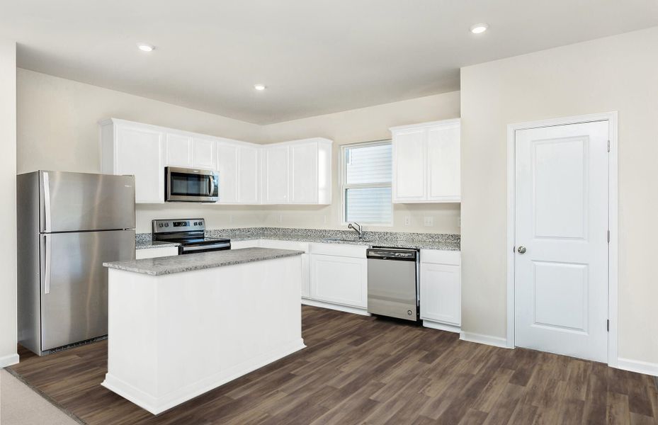 Package A Kitchen with beautiful white cabinets and granite countertops