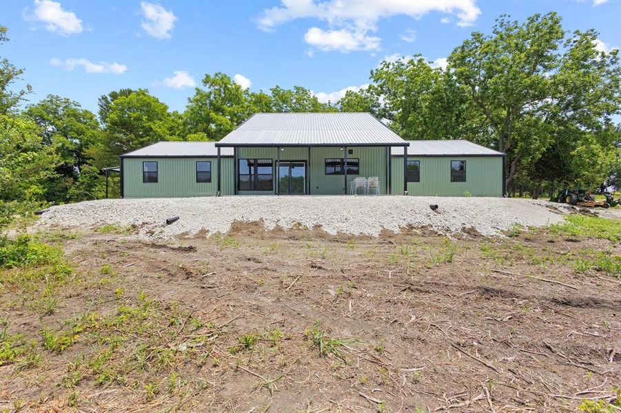 Front exterior of a new home in , Honey Grove, TX, highlighting curb appeal (Image 2). Front exterior of a new home in , Honey Grove, TX, highlighting curb appeal (Image 2).