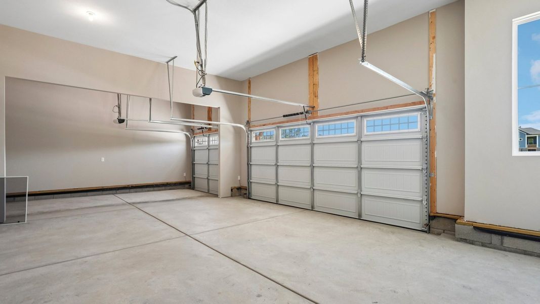 Spacey three-car garage for storage convenience Spacey three-car garage for storage convenience