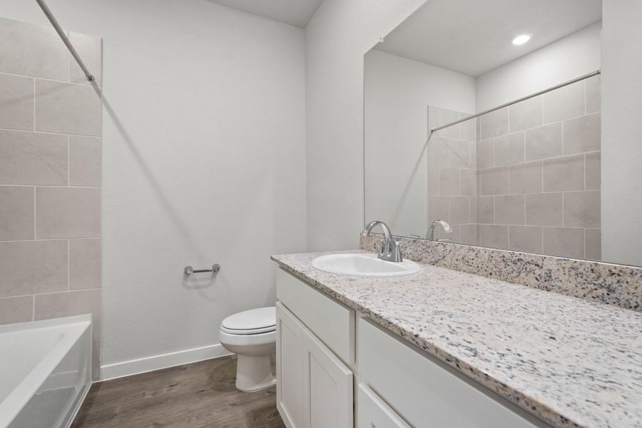 Furnished interior view inside a new home in Lexington Heights, Willis (Image 8).