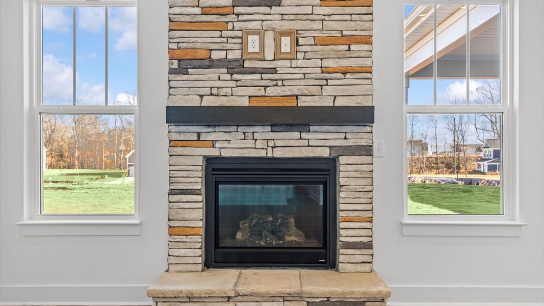 First-class living space featuring expansive ceilings, elegant design, and open sightlines to the kitchen