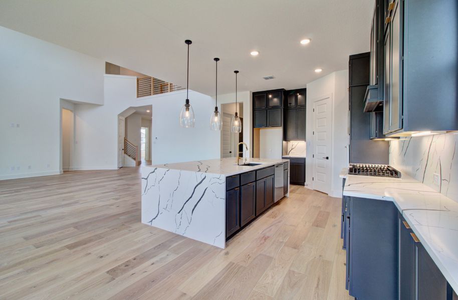 Representative furnished interior of a home built from the Signature Series - Partridge by DRB Homes in Oaks at San Gabriel, Georgetown (Image 7). Representative furnished interior of a home built from the Signature Series - Partridge by DRB Homes in Oaks at San Gabriel, Georgetown (Image 7).