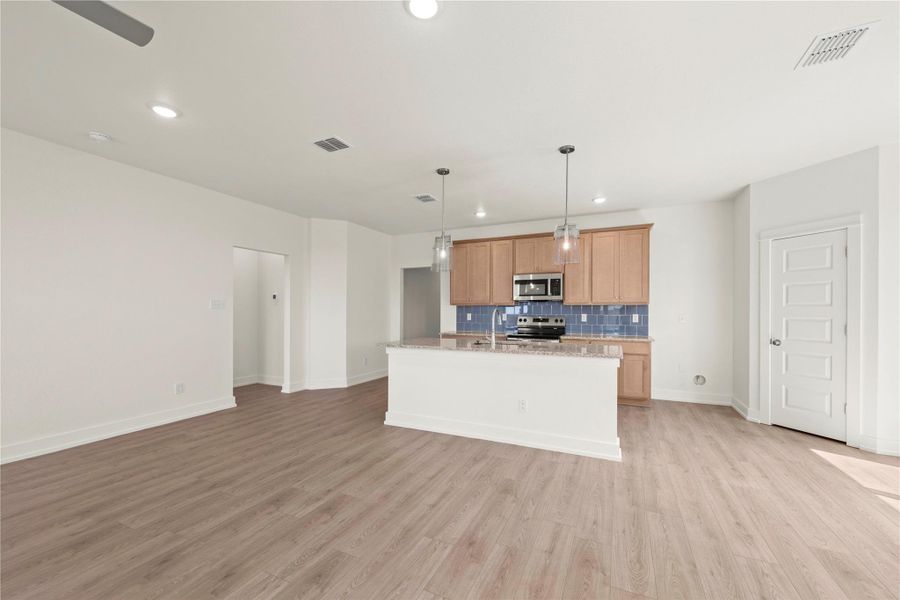 Please Note: These interior photos are not of the actual home but are of a completed one with a simialr floor plan. Finishes, features, and layouts may vary.