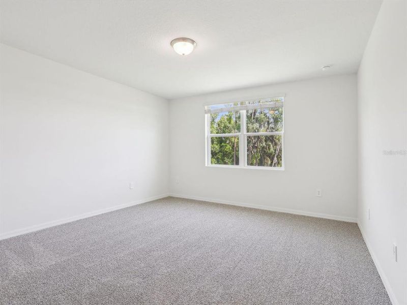 Spacious, unfurnished interior of a new home in The Reserve at Van Oaks, Auburndale (Image 25).