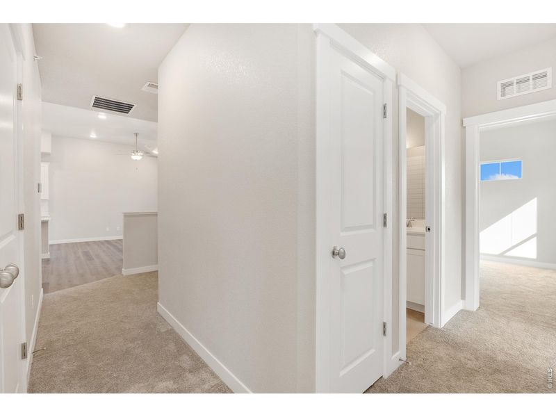 Spacious, unfurnished interior of a new home in The Lakes at Centerra - Discovery, Loveland (Image 18).