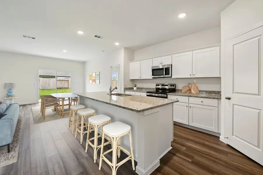 Representative furnished interior of a home built from the Firefly by Starlight Homes in Cottonwood Creek, San Marcos (Image 3).