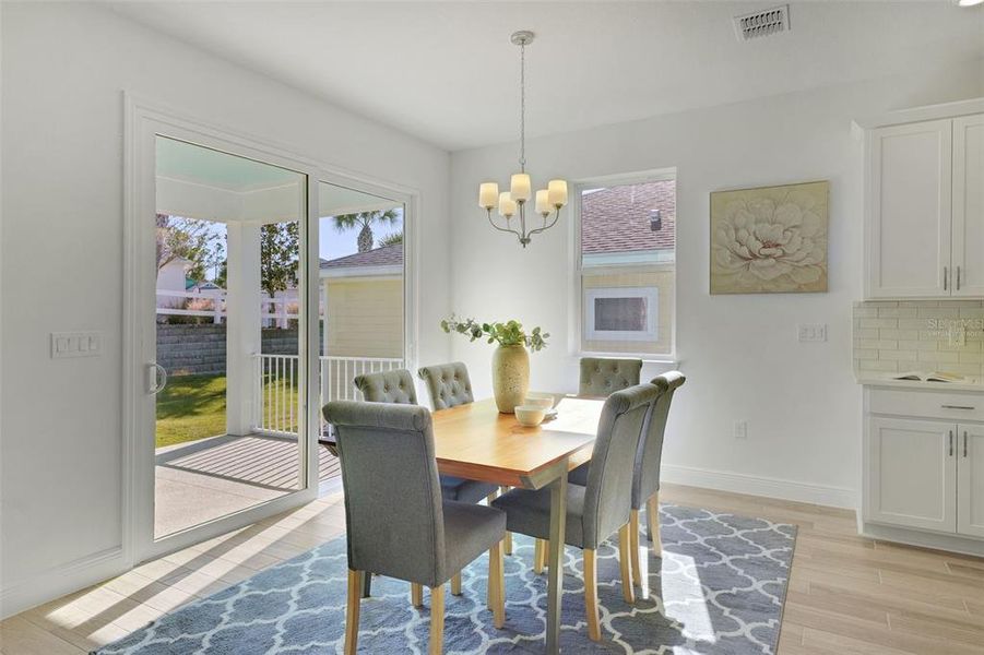 Furnished interior view inside a new home in Green Key Village, Lady Lake (Image 8).