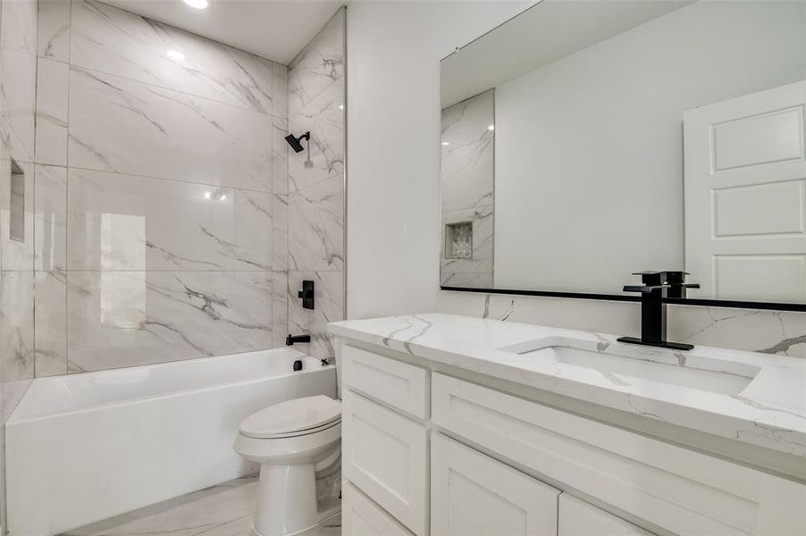 Full bath with tub / shower combination and vanity