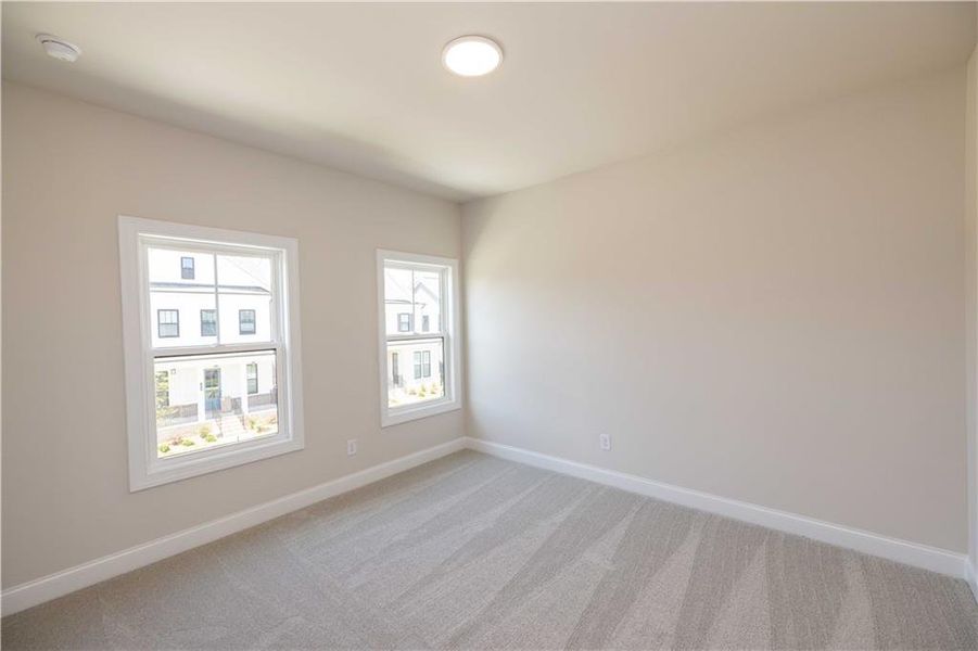Spacious, unfurnished interior of a new home in Waterhaven, Cumming (Image 31).