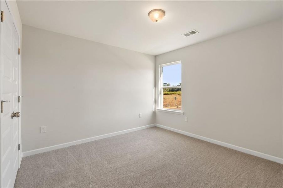 Spacious, unfurnished interior of a new home in The Brooke at Rivertown, South Fulton (Image 25).