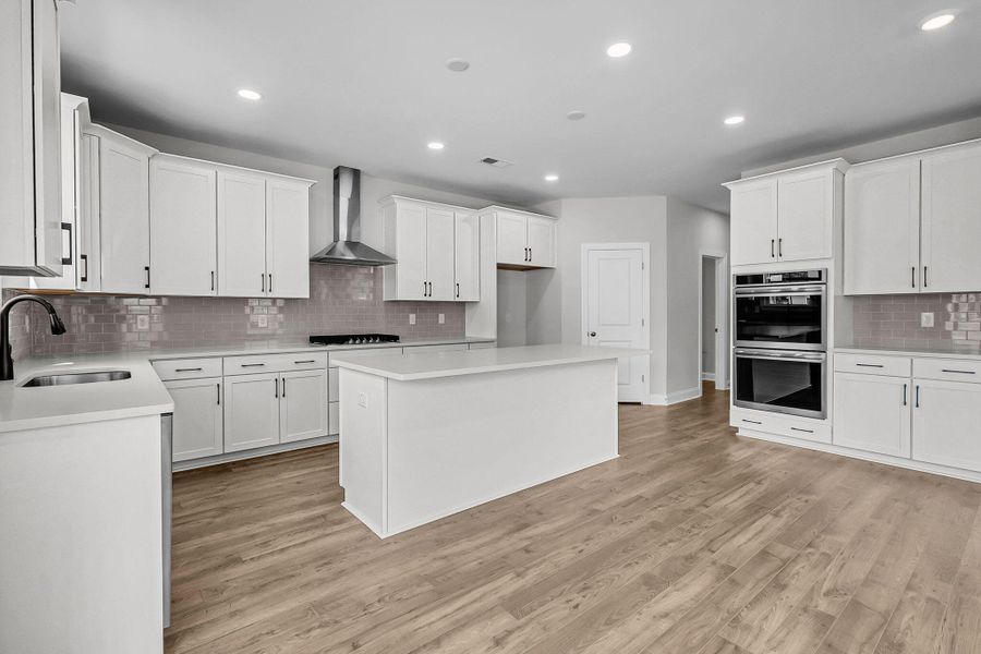 Furnished interior view inside a new home in Tidewater at Lakes of Cane Bay, Summerville (Image 7).