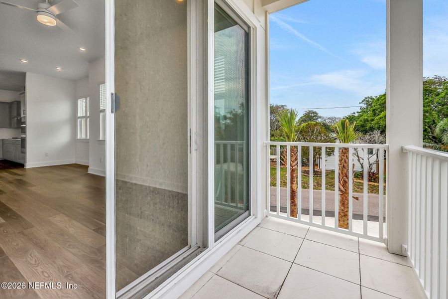 Exterior details and patio area of a home in North Beach Townhomes, Jacksonville Beach (Image 4).