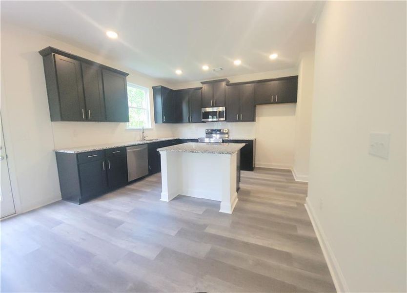 Furnished interior view inside a new home in Clark Farms, Flowery Branch (Image 11).