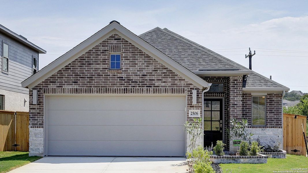 Front exterior of a new home in Ladera 40', San Antonio, TX, highlighting curb appeal (Image 1). Front exterior of a new home in Ladera 40', San Antonio, TX, highlighting curb appeal (Image 1).