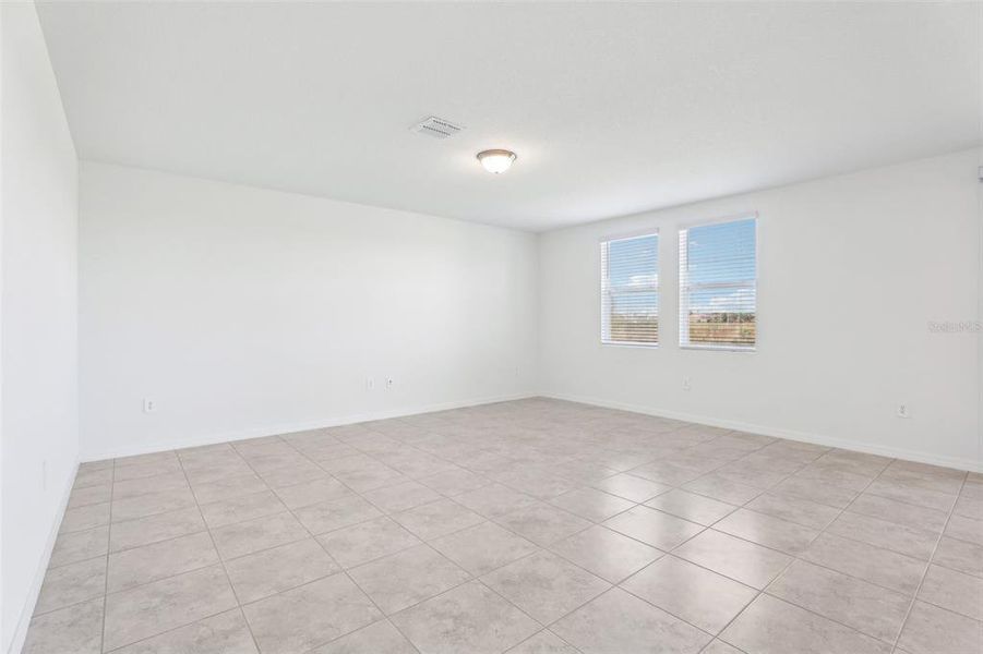 Spacious, unfurnished interior of a new home in Lake Deer Estates - Signature Series, Poinciana (Image 34). Spacious, unfurnished interior of a new home in Lake Deer Estates - Signature Series, Poinciana (Image 34).