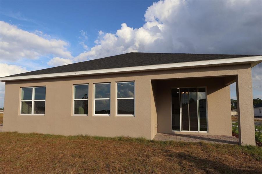 Exterior details and patio area of a home in Bay Lake Farms, St. Cloud (Image 24).