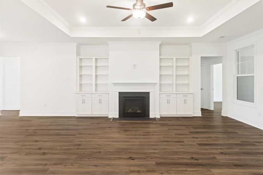 LVP floors anchor this open space featuring a clas