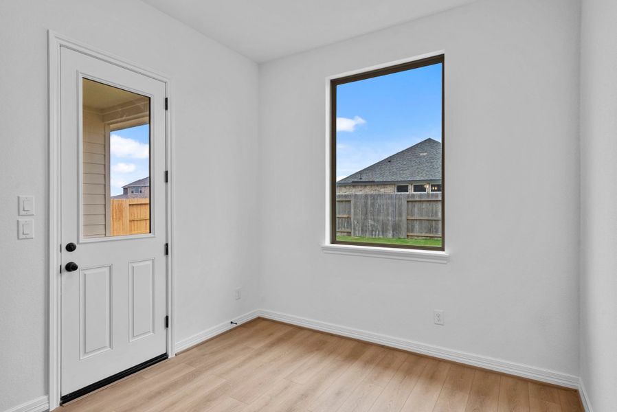 Sophisticated breakfast space off the kitchen, perfect for entertaining.