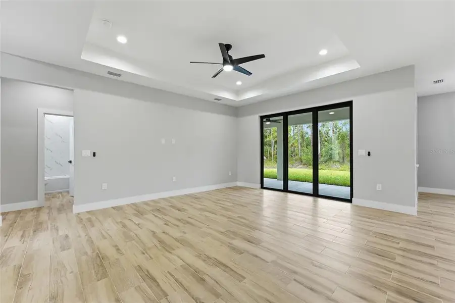 Spacious, unfurnished interior of a new home in , Port Charlotte (Image 30).