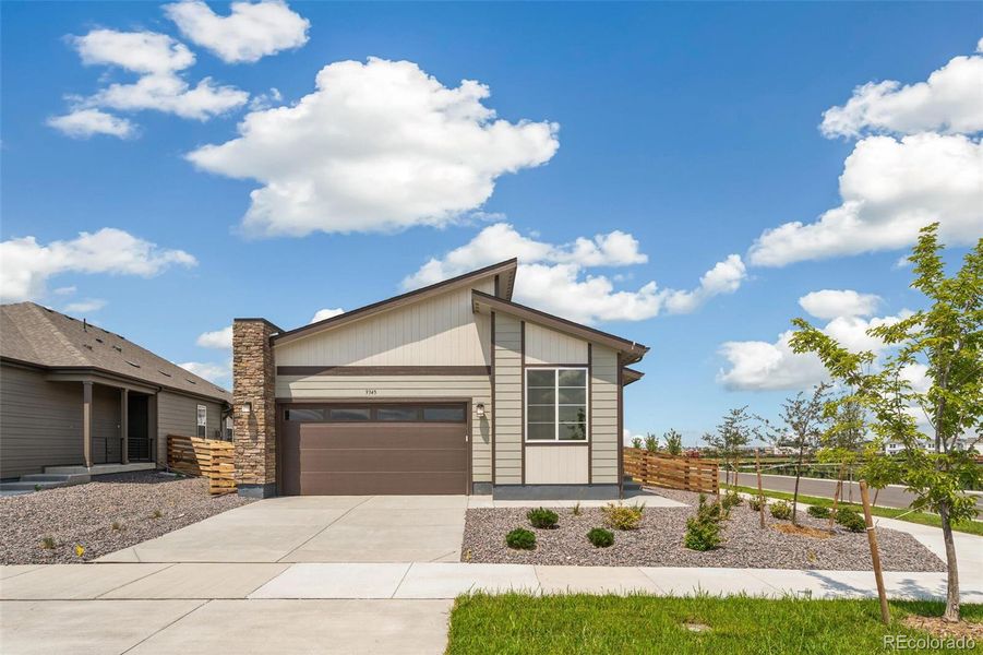Front exterior of a new home in Legato, Commerce City, CO, highlighting curb appeal (Image 21).