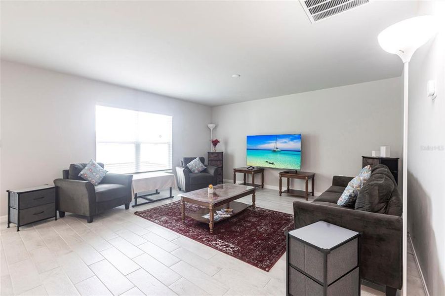 Furnished interior view inside a new home in , Port Charlotte (Image 7).