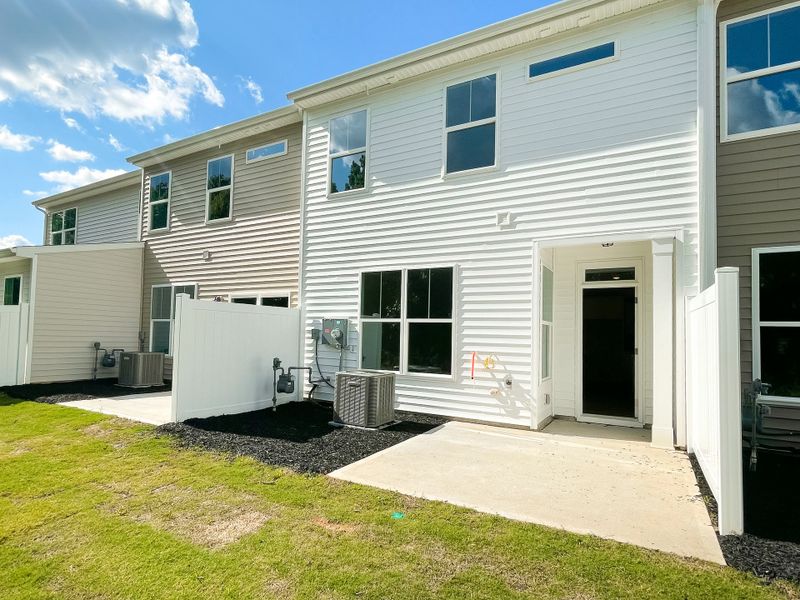Front exterior of a new home in Fairview Village Townhomes, Simpsonville, SC, highlighting curb appeal (Image 17).