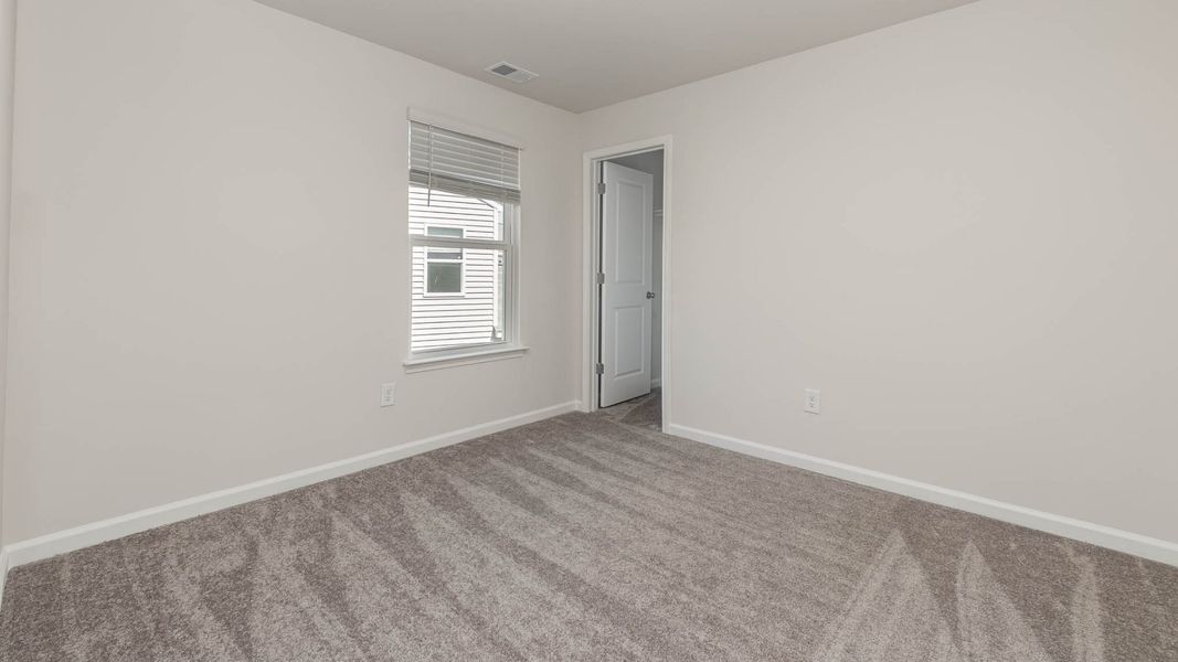 Representative unfurnished interior of a home built from the WREN by D.R. Horton in Cedar Hill Landing, Navassa (Image 26).