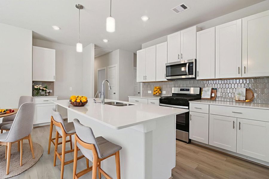 Photo is not of the actual home, but is an inspirational photo of builder’s model home and may depict options, furnishings, and/or decorator features that are not included