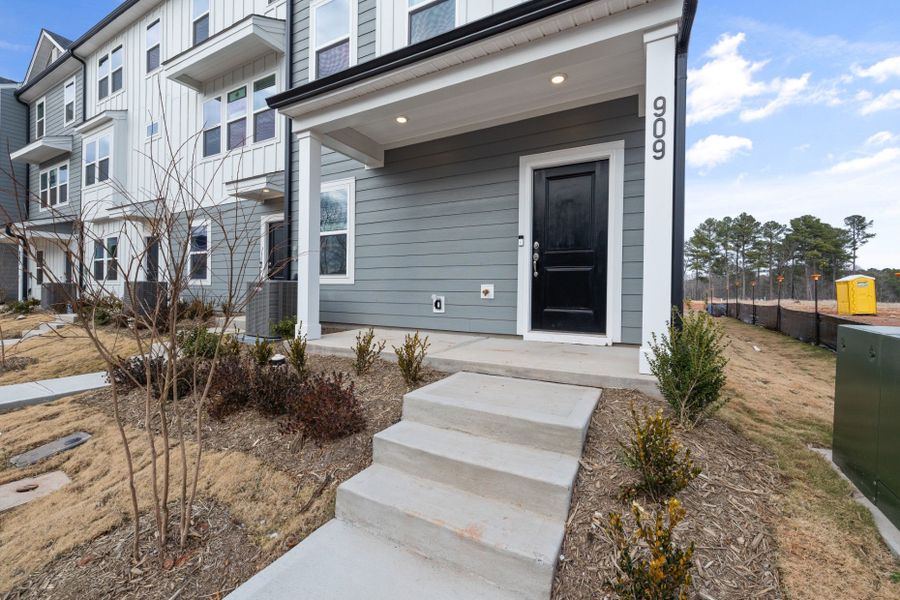 Exterior details and patio area of a home in Everton, Durham (Image 31).