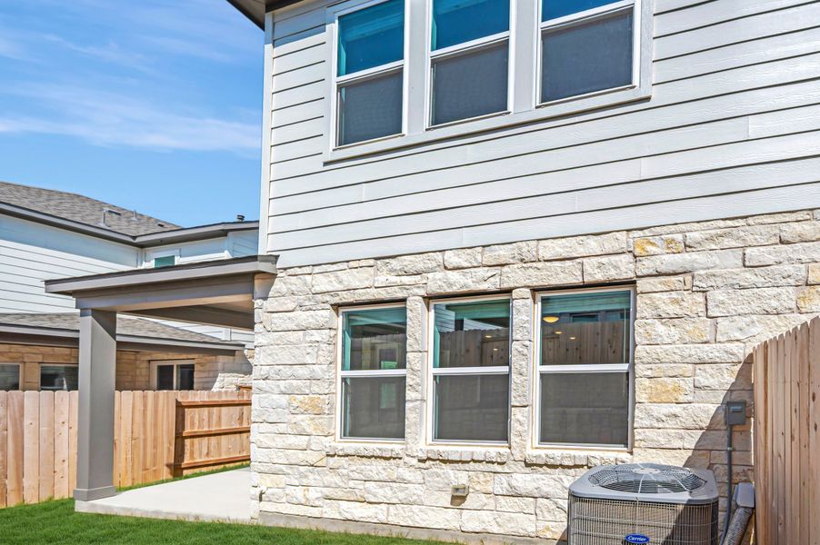 Exterior details and patio area of a home in Park Central, Georgetown (Image 27).