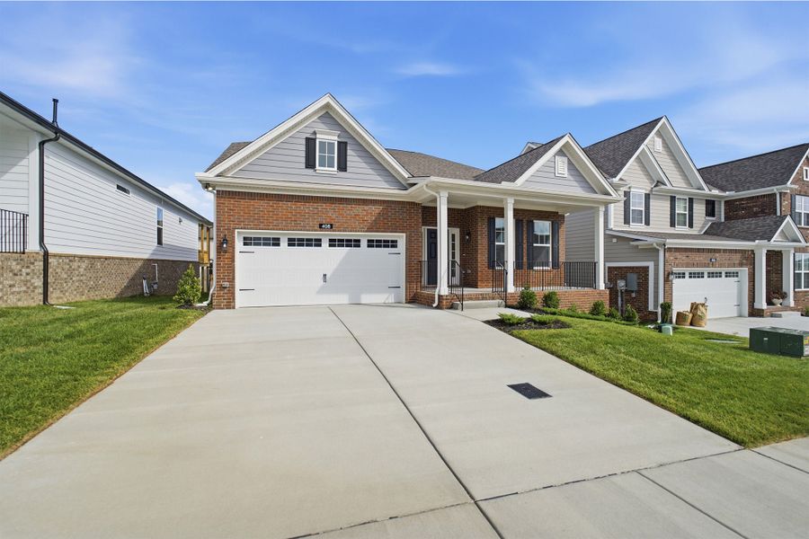 Front exterior of a new home in McCain's Station, Gallatin, TN, highlighting curb appeal (Image 28). Front exterior of a new home in McCain's Station, Gallatin, TN, highlighting curb appeal (Image 28).