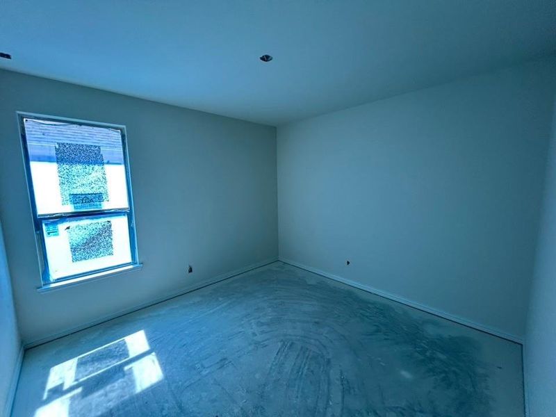 Unfurnished room featuring baseboards