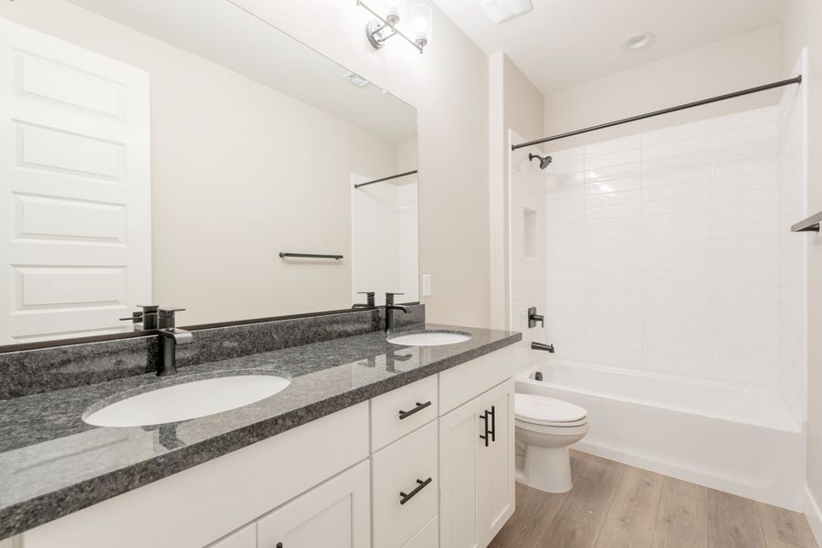 Representative furnished interior of a home built from the Larkspur by DRB Homes in The Villas at Mystic, Peoria (Image 9).