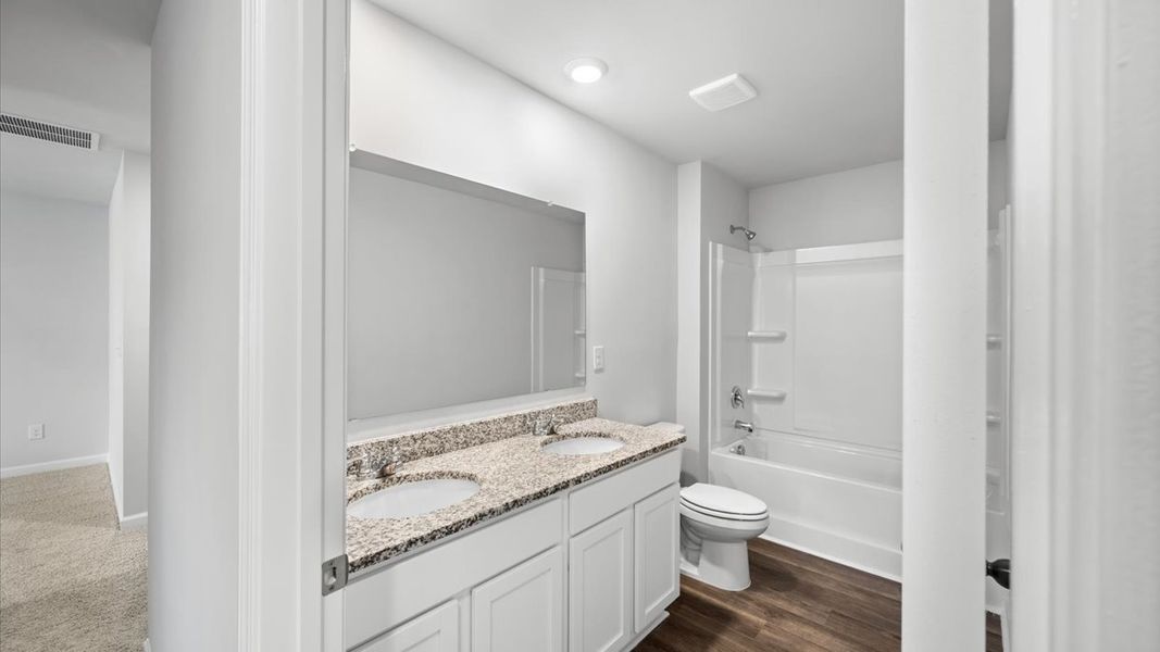Furnished interior view inside a new home in Highland Hills, Graniteville (Image 10).