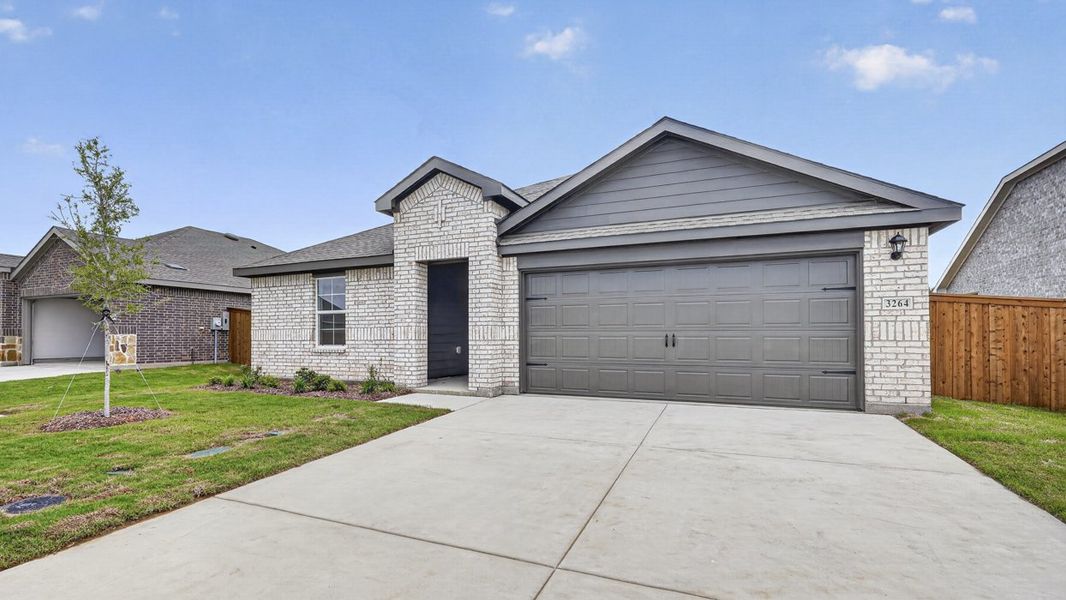 Front exterior of a new home in Forestbrook Estates, Paris, TX, highlighting curb appeal (Image 10). Front exterior of a new home in Forestbrook Estates, Paris, TX, highlighting curb appeal (Image 10).