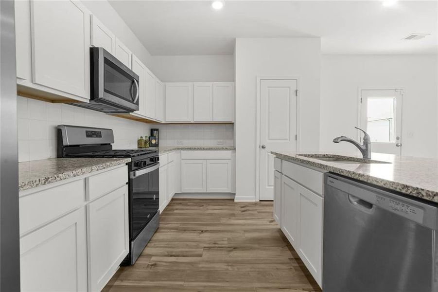 Furnished interior view inside a new home in Alder Park, Conyers (Image 11).