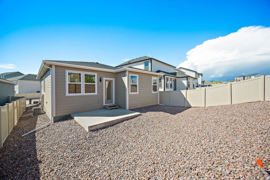 Exterior details and patio area of a home in Trails at Aspen Ridge-3, Colorado Springs (Image 15).