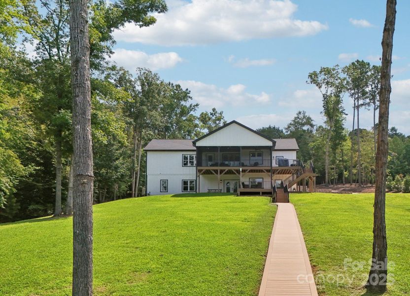 Front exterior of a new home in , New London, NC, highlighting curb appeal (Image 24). Front exterior of a new home in , New London, NC, highlighting curb appeal (Image 24).