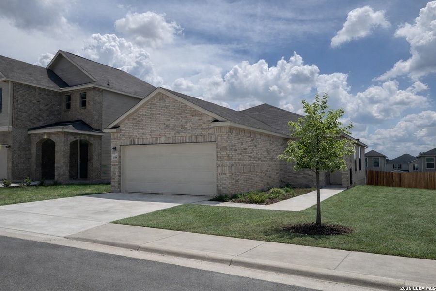 Front exterior of a new home in , San Antonio, TX, highlighting curb appeal (Image 1). Front exterior of a new home in , San Antonio, TX, highlighting curb appeal (Image 1).