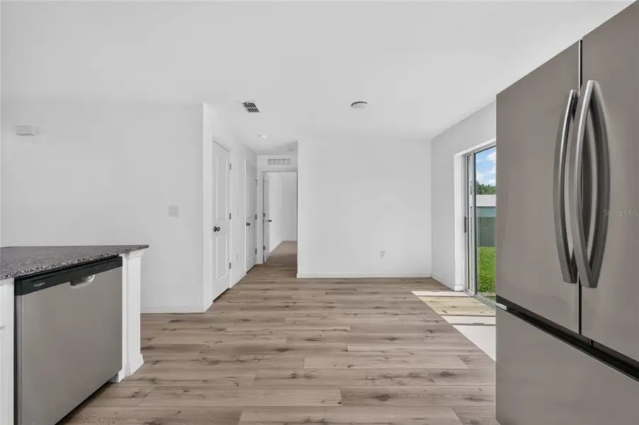 Spacious, unfurnished interior of a new home in , Port Charlotte (Image 34).