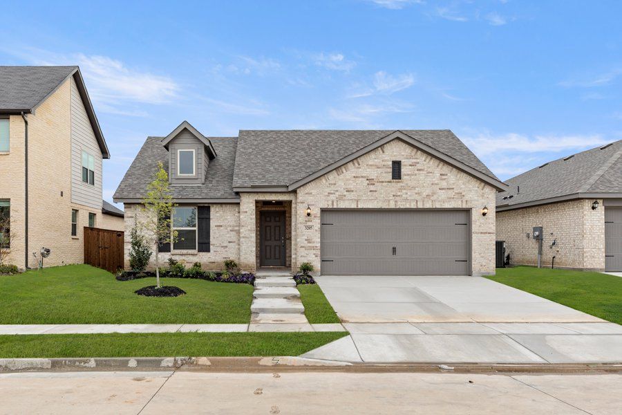 Representative exterior photo of a completed home built from the Cheyenne by Impression Homes in DeBerry Reserve, Royse City, TX (Image 1).