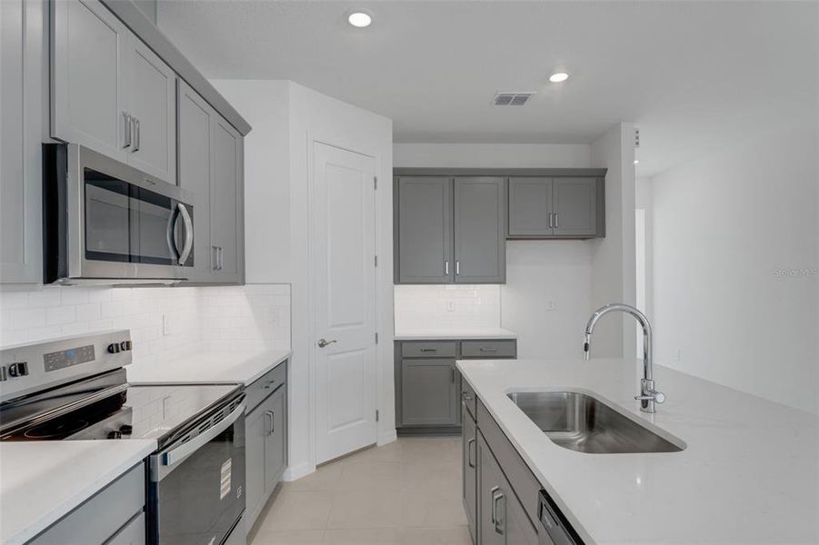 Furnished interior view inside a new home in Seaire, Parrish (Image 7).