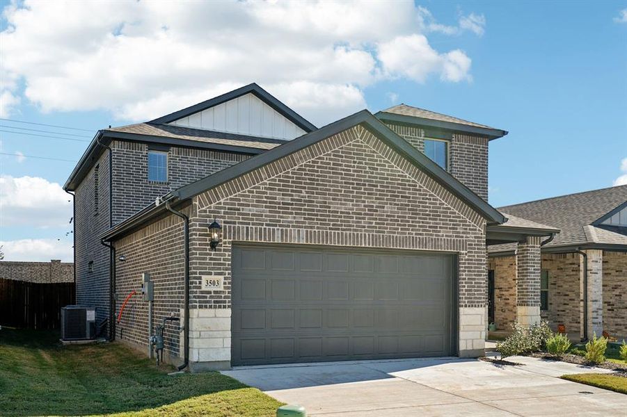 Front exterior of a new home in Southridge - Spring Series, McKinney, TX, highlighting curb appeal (Image 2).